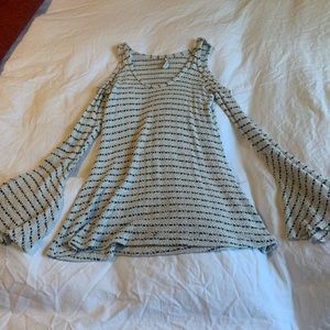 White and Black bell sleeve top.